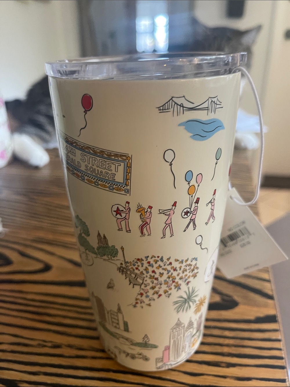 Macy's Cream Travel Tumbler with Colorful Parade Illustration